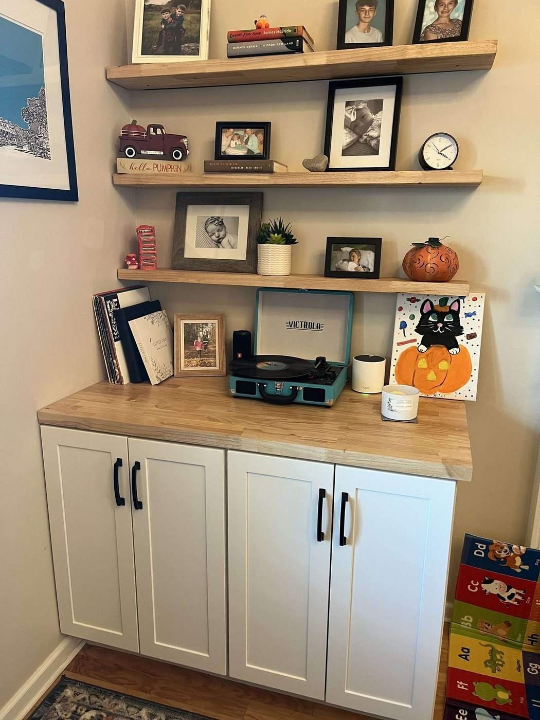 Built-in cabinet with drawers and display shelving