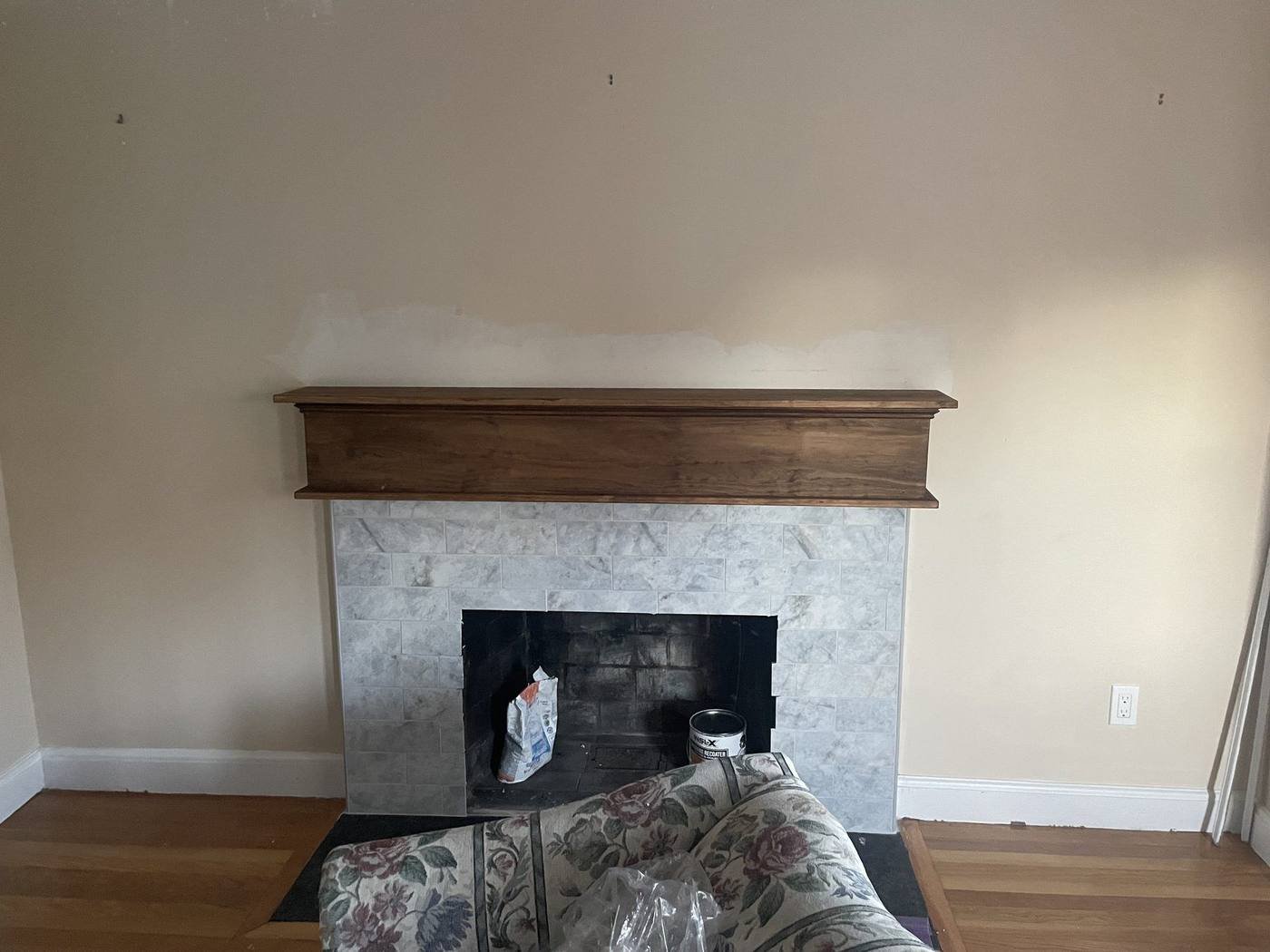 New stone surround and timber mantel going in, room protected