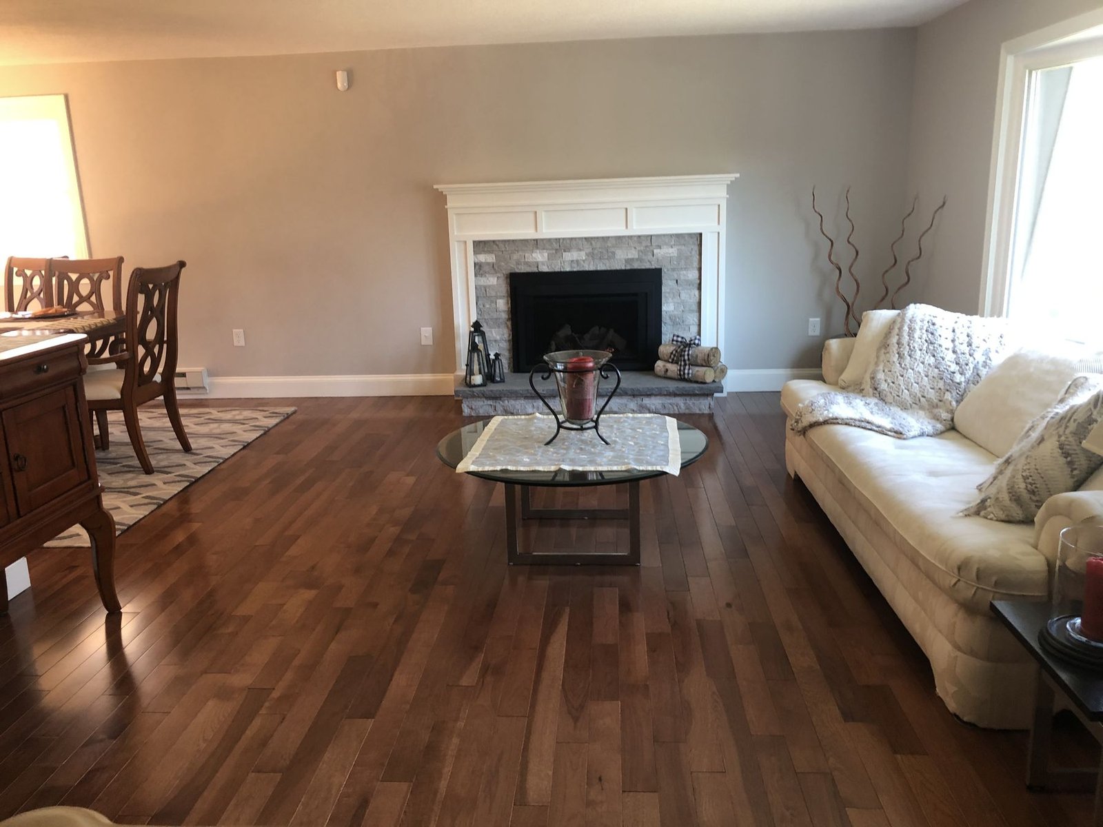 Finished living room with fireplace