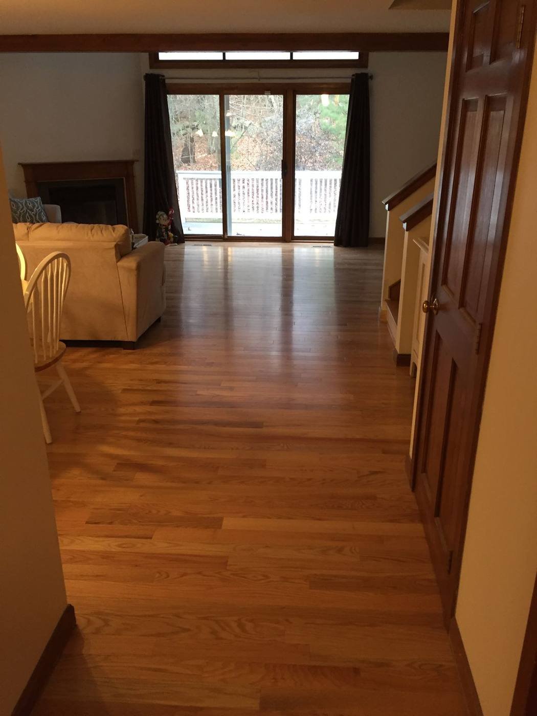 Red oak flooring running through to a slider