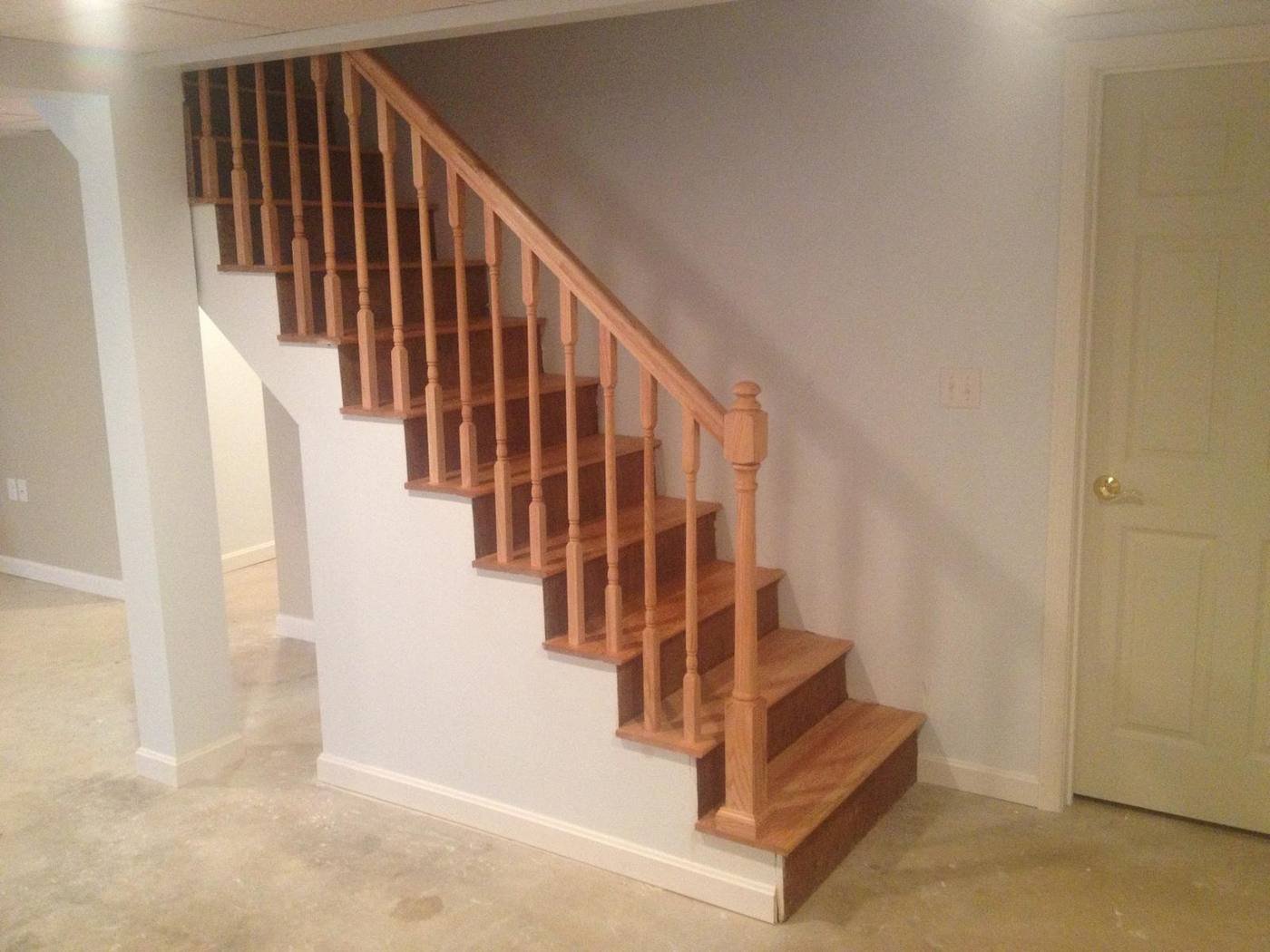 Oak staircase with white risers and oak railing