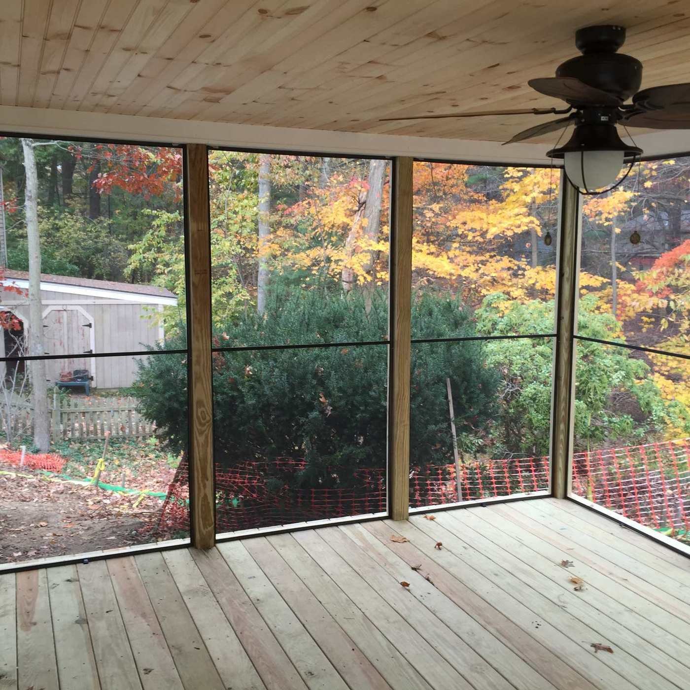 Corner of the screened porch with deck flooring