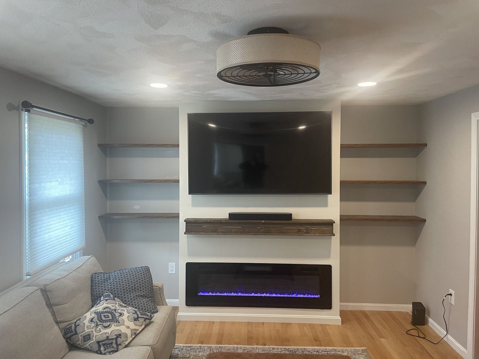 Built-in TV wall with linear fireplace