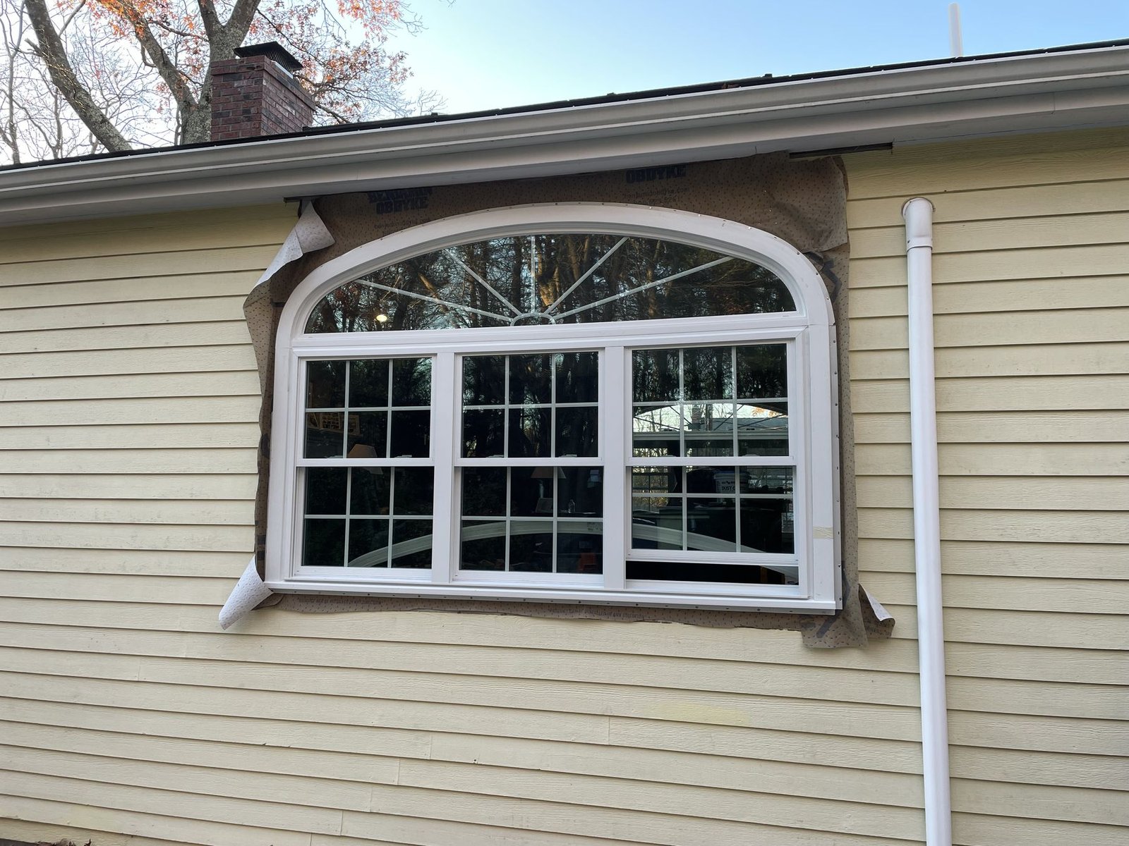 Arched window installed